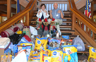 HHCS-Co-Presidents-Linda-and-Glenn-Neff-with-Toy-Drive-Donations
