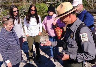 St Phillips Coastal Region Interpreter Terry Conway Explains Native American Artifacts Found on the Beach